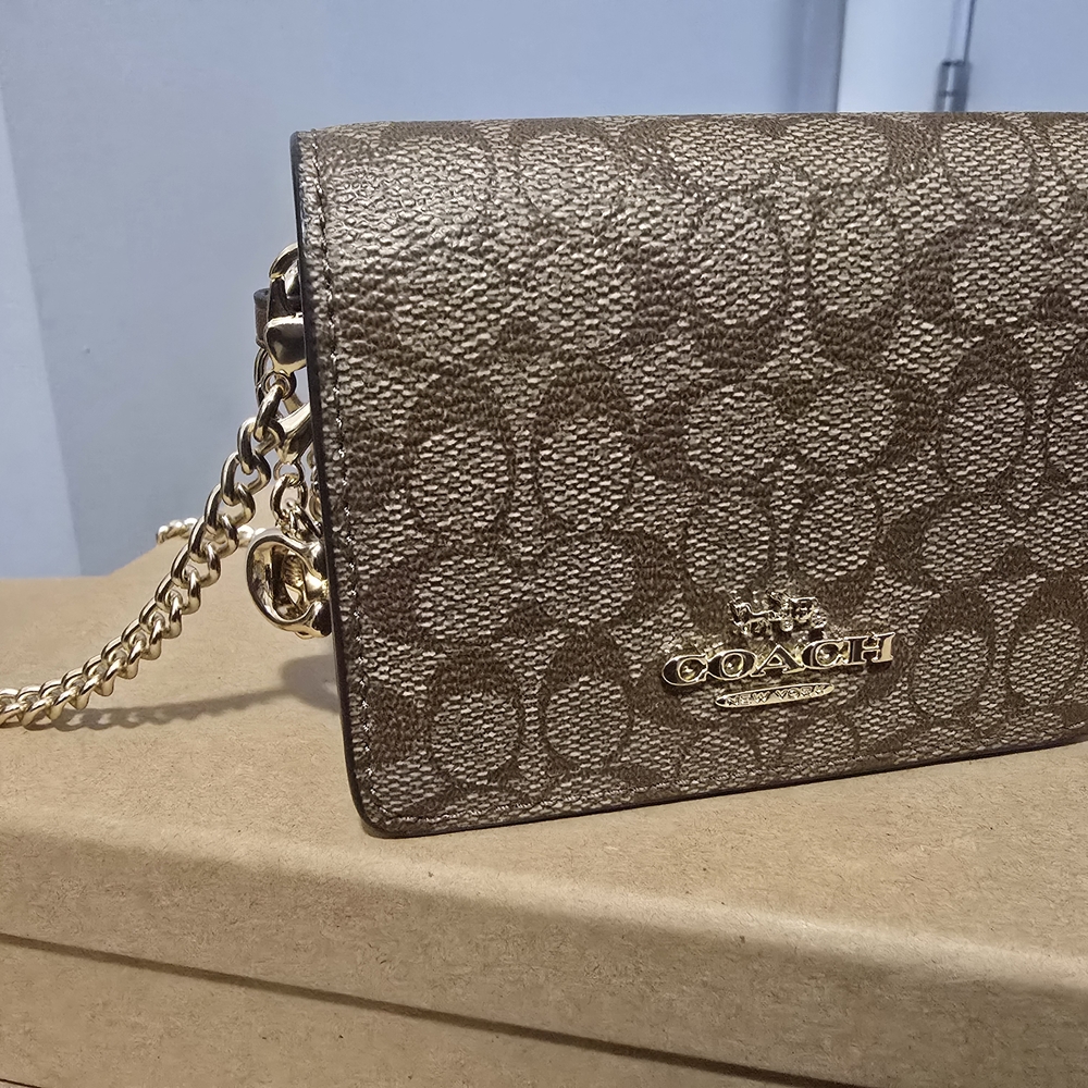 Coach Brown and Gold Crossbody Bag with Monogram Pattern